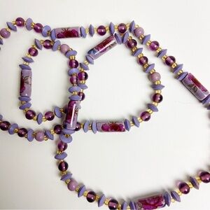Purple long strand artisan necklace clay beads with rose details